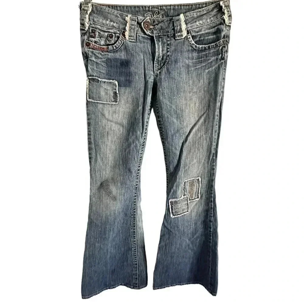 Silver Jeans Bolt women's 28/31 measures 28/29 patched light wash flared